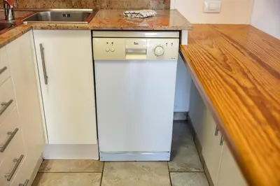 Una cocina o zona de cocina en Oasis Holycan - by Gestión Vacacional Canarias