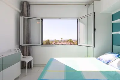 Cama o camas de una habitación en Sunandsea Apartment
