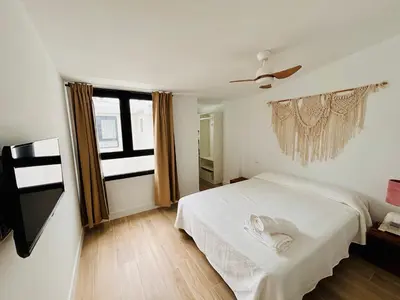 Cama o camas de una habitación en Playa de las Canteras-Albareda 2