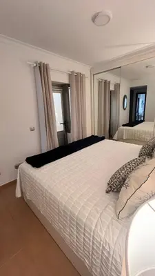 Cama o camas de una habitación en VV Janoa Playa Las Canteras 1