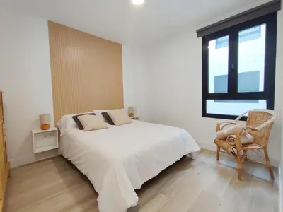 Cama o camas de una habitación en Luxury Apartments Las Canteras