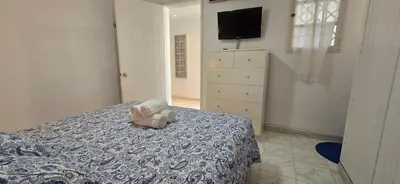 Cama o camas de una habitación en Casa Playa San Agustin