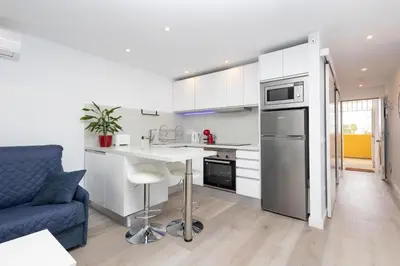 Una cocina o zona de cocina en Bonito Apartamento en Maspalomas