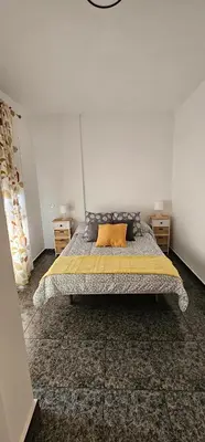 Cama o camas de una habitación en Piso Amanecer CRUCE ARINAGA