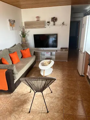 Una televisión o centro de entretenimiento en Garza Attic House
