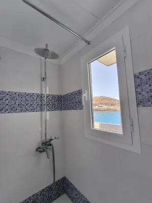 Un baño de Ocean Attic Tufia