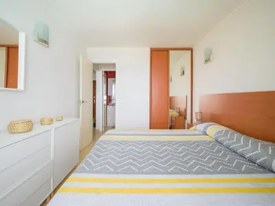 Cama o camas de una habitación en Amanecer Playa Patalavaca