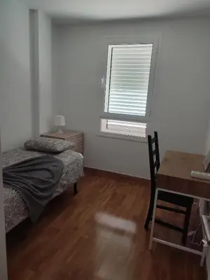 Cama o camas de una habitación en Villa Milena