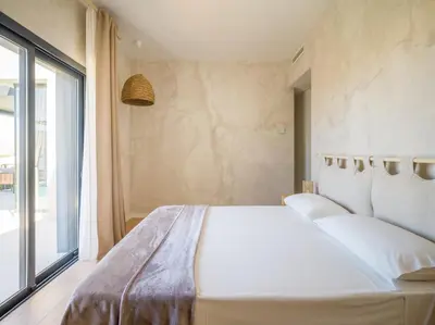 Cama o camas de una habitación en Salobre Golf Villas Yucas