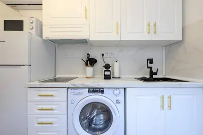 Una cocina o zona de cocina en Charming studio in old town Triana San Telmo