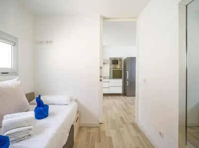 Cama o camas de una habitación en Beyond Amadores 12
