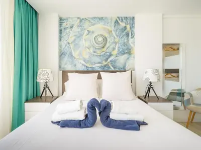 Cama o camas de una habitación en Beyond Amadores 12
