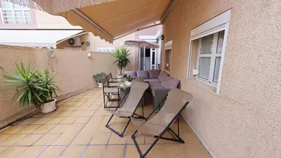 Un balcón o terraza de Casa MOLINA con TERRAZA al lado de la playa