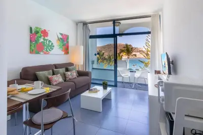 Zona de estar de Beachfront Apartment Playa del Cura 3 by VillaGranCanaria