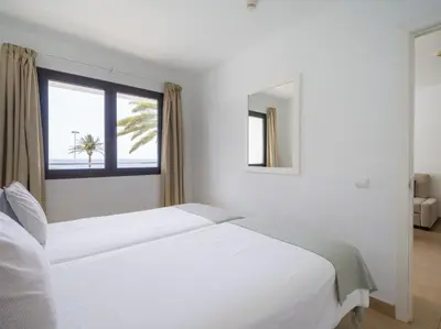 Cama o camas de una habitación en Liszt Suites San Agustin