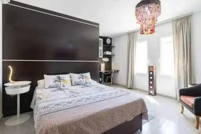 Cama o camas de una habitación en ALBATROS 1L Tres habitaciones
