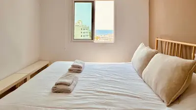 Cama o camas de una habitación en Click&Guest - Beach Star Apartment in Maspalomas