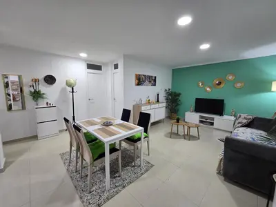 Una televisión o centro de entretenimiento en Strelitzia House