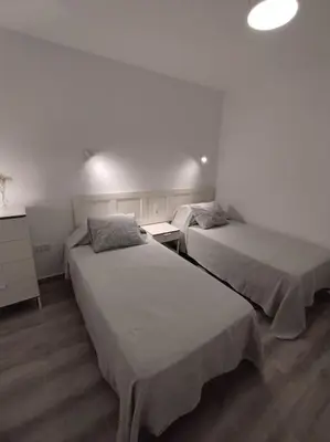 Cama o camas de una habitación en Flamboyán Vista Mar