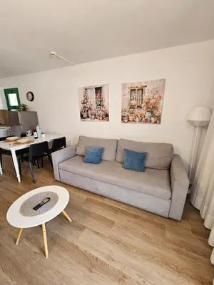 Zona de estar de apartamentos canaima 217