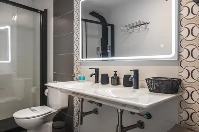 Un baño de Home2Book Beachy Vibes Sea Side Apartment, Guía