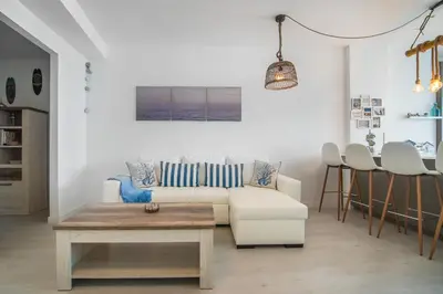 Zona de estar de Home2Book Beachy Vibes Sea Side Apartment, Guía