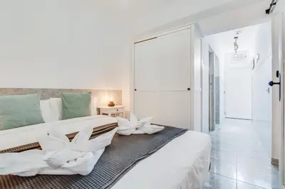 Cama o camas de una habitación en Home2Book Stunning BeachFront Apt, Pozo Izquierdo