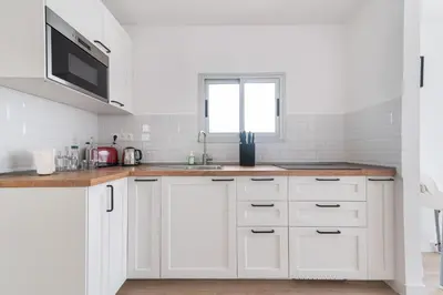 Una cocina o zona de cocina en Home2Book Design Attic City&Beach Views Las Palmas