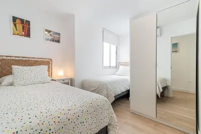 Cama o camas de una habitación en Home2Book Design Attic City&Beach Views Las Palmas
