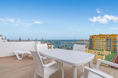 Un balcón o terraza de Home2Book Chic Attic City&Beach Views Las Palmas