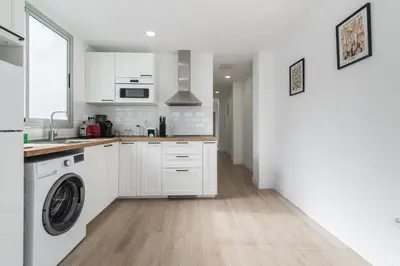 Una cocina o zona de cocina en Home2Book Chic Attic City&Beach Views Las Palmas