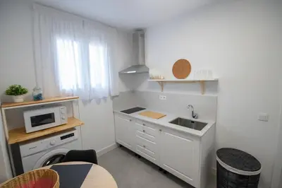 Una cocina o zona de cocina en Apartamentos Marmolejos