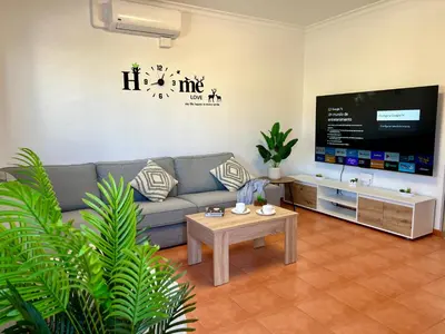 Zona de estar de Villa Puerto Rico in front of the shopping center with private heated saltwater pool with jacuzzi function & arcade games OR St andard Villa Puerto Rico in front of the shopping center with private heated saltwater large jacuzzi No Pool& arcade games
