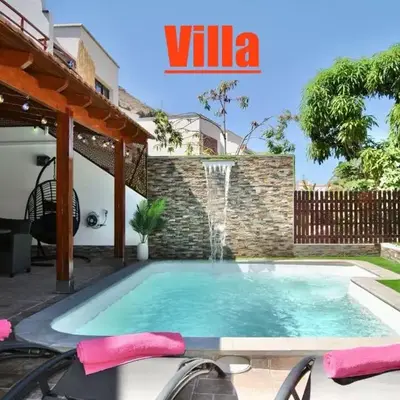 Villa Puerto Rico in front of the shopping center with private heated saltwater pool with jacuzzi function & arcade games OR St andard Villa Puerto Rico in front of the shopping center with private heated saltwater large jacuzzi No Pool& arcade games