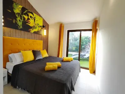 Cama o camas de una habitación en Bungalow BAHIA AMARILLO