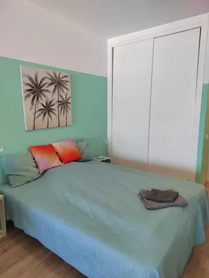 Cama o camas de una habitación en Luas Beachfront house las Canteras