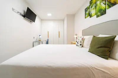 Cama o camas de una habitación en Apartamento Moderno Playa de las Canteras -Las Palmas Gran Canaria