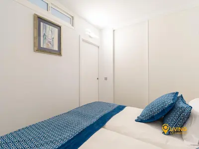 Cama o camas de una habitación en Living Las Canteras Homes - Seaview