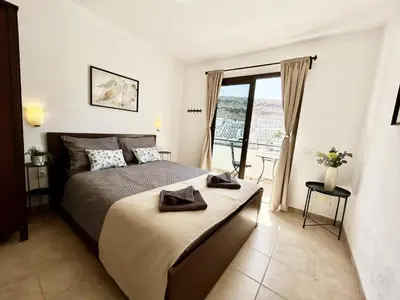 Cama o camas de una habitación en Sunny Monaco Puerto Rico