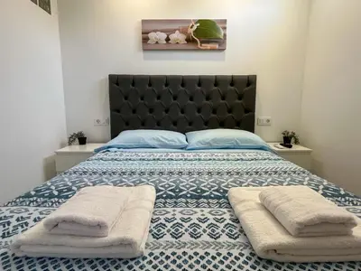 Cama o camas de una habitación en Beautiful apartment near the sea in Arguineguín