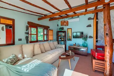 Zona de estar de Las Casas de la Rueda - La Casita