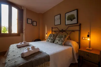 Cama o camas de una habitación en Casa Emblemática La Alameda