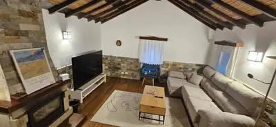 Una televisión o centro de entretenimiento en CASA EL CORREDOR