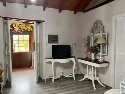 Una televisión o centro de entretenimiento en Casa Abuelitilla