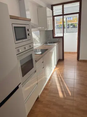 Una cocina o zona de cocina en Casa de la Plaza San Mateo