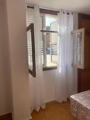 Cama o camas de una habitación en Casa de la Plaza San Mateo