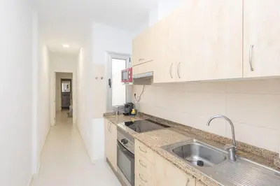 Una cocina o zona de cocina en Piso Playa Las Canteras