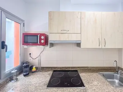 Una cocina o zona de cocina en Piso Playa Las Canteras
