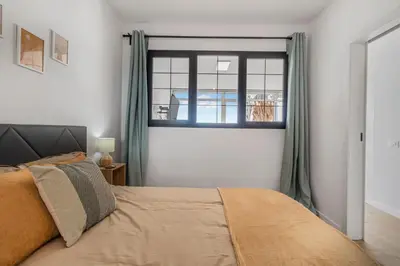 Cama o camas de una habitación en Urban Elegance View Suite Pool