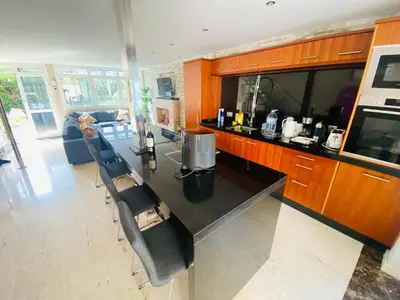 Una cocina o zona de cocina en Puerto Rico duplex with community pool close to the beach